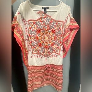 - Beautiful embroidered blouse, adjustable at waist. Fresh 100% cotton